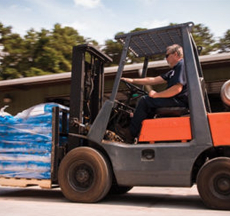 Man driving a forklift